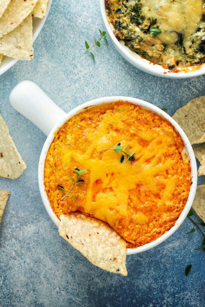 Image of buffalo chicken dip made in a crockpot perfect for summer