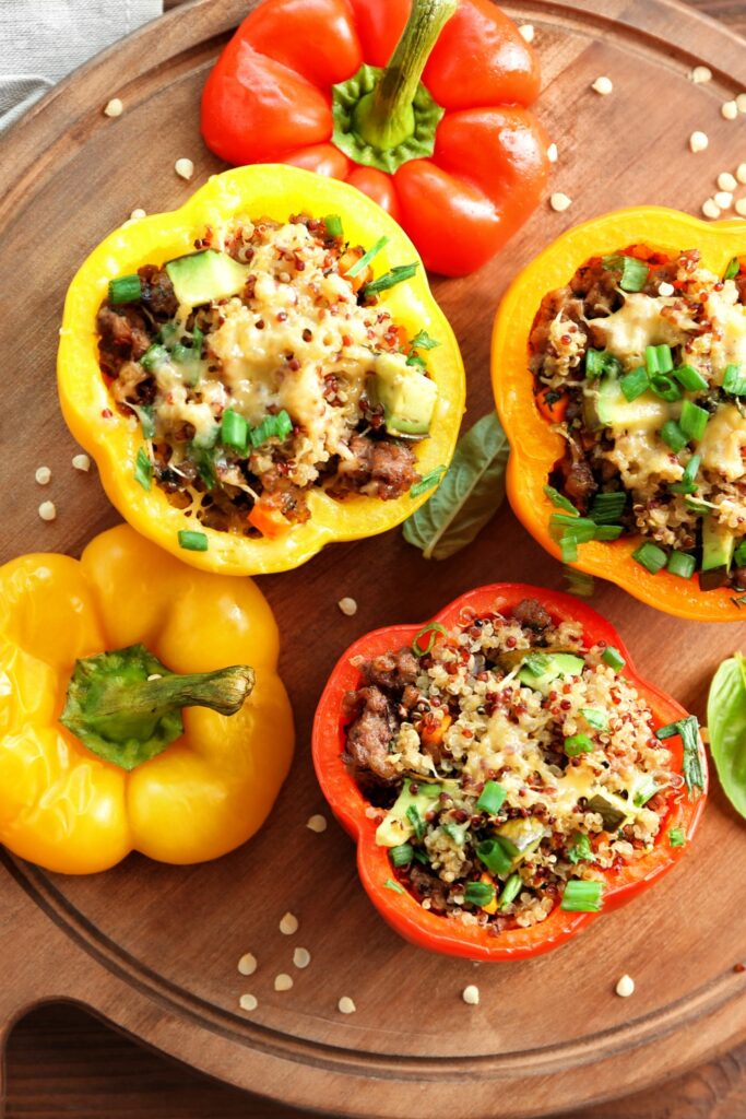 Image of stuffed peppers made in a crockpot perfect for summer