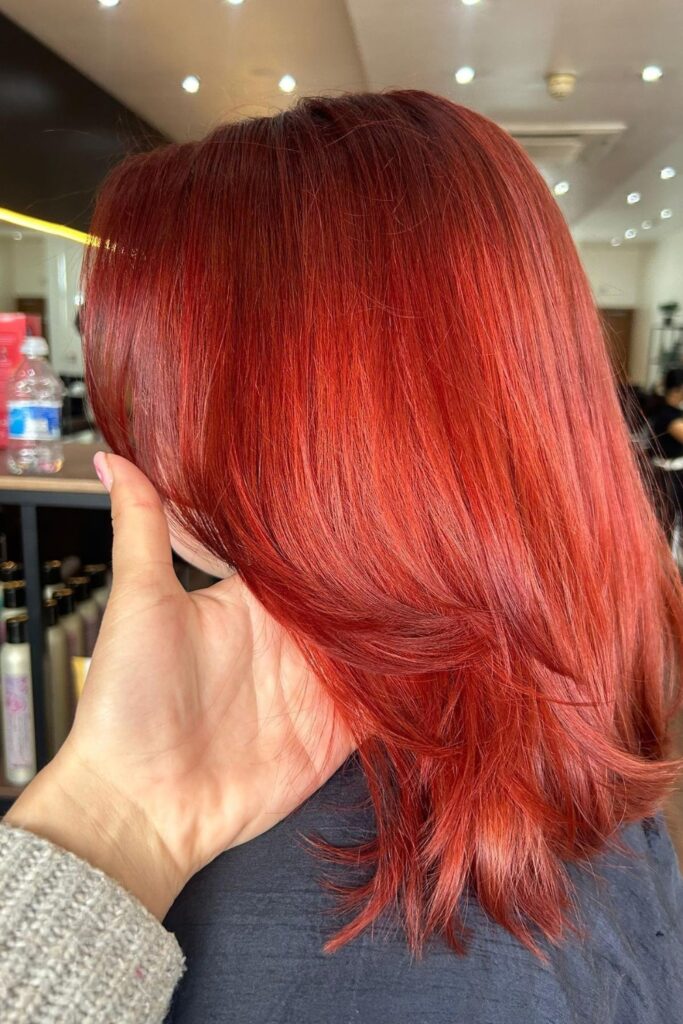 Image showing a summer hair trend color which is reddish orange